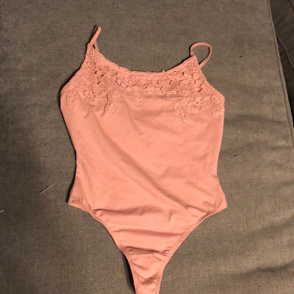 Pink floral-laced bodysuit